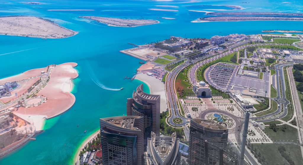 Luxury Abu Dhabi yacht charter aerial coastline with islands marina and turquoise waters