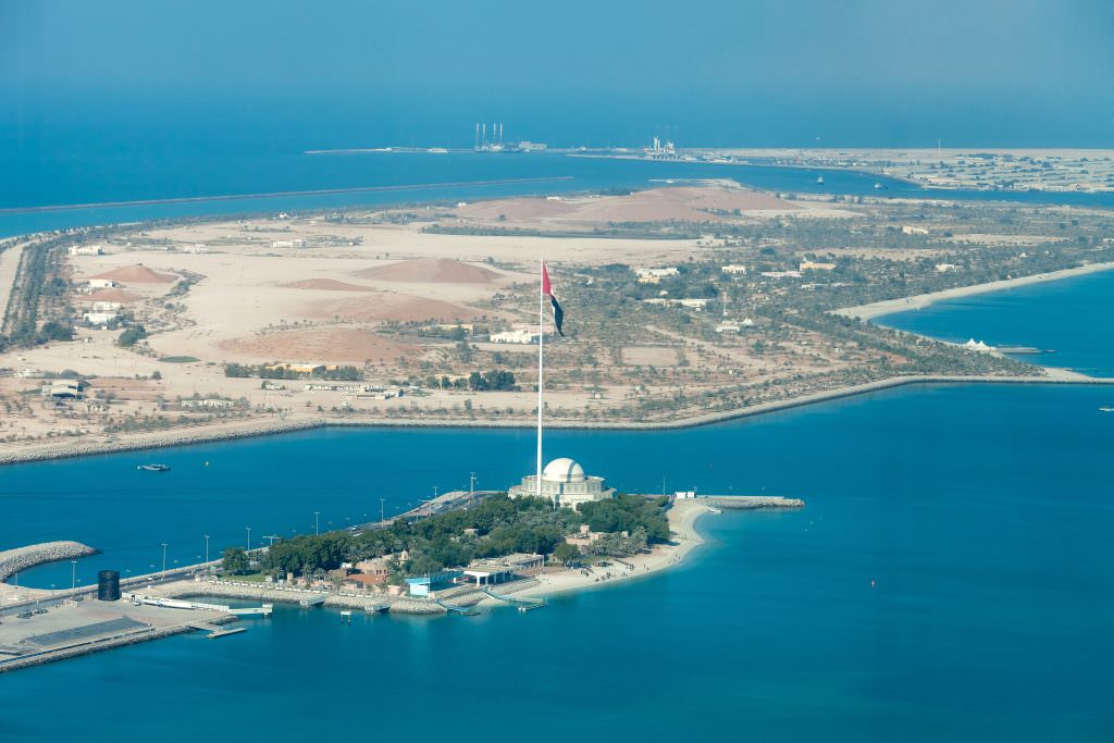 Luxury Abu Dhabi yacht charter aerial view of Flag Island coastline and marina
