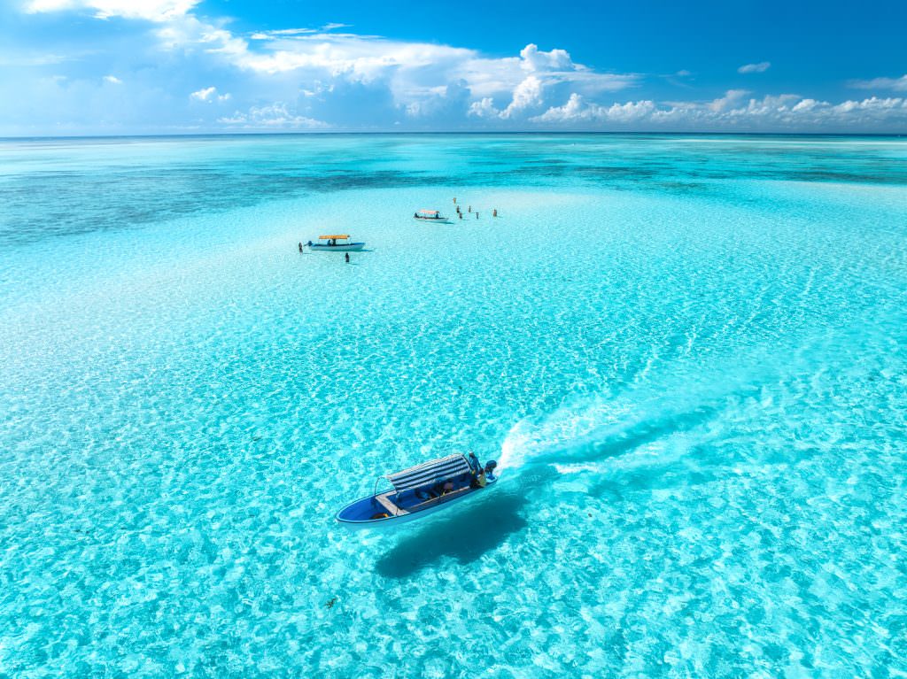 Exumas yacht charter luxury sailing experience Bahamas crystal clear water islands