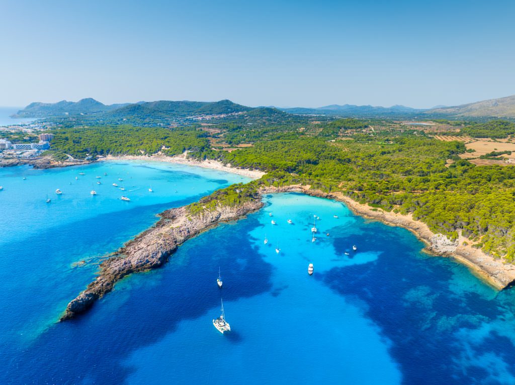 Yachts anchored in the turquoise bays of Mallorca