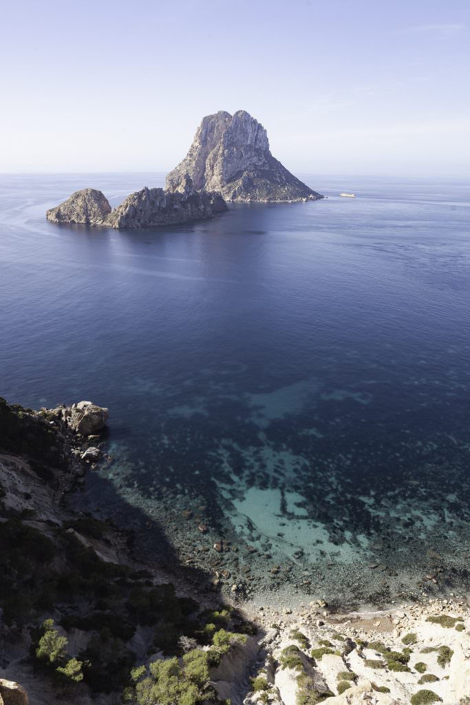 Ibiza yacht charter beach coastline turquoise water luxury sailing Spain