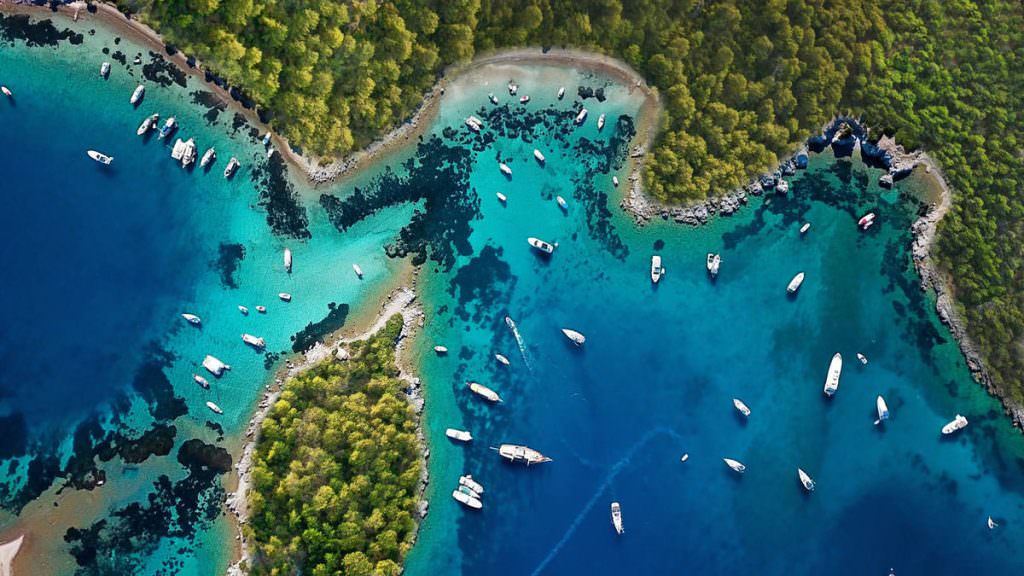 Luxury Gokova Gulf Yacht Charter Aerial view of yachts in Gokova Bay turquoise coast Turkey