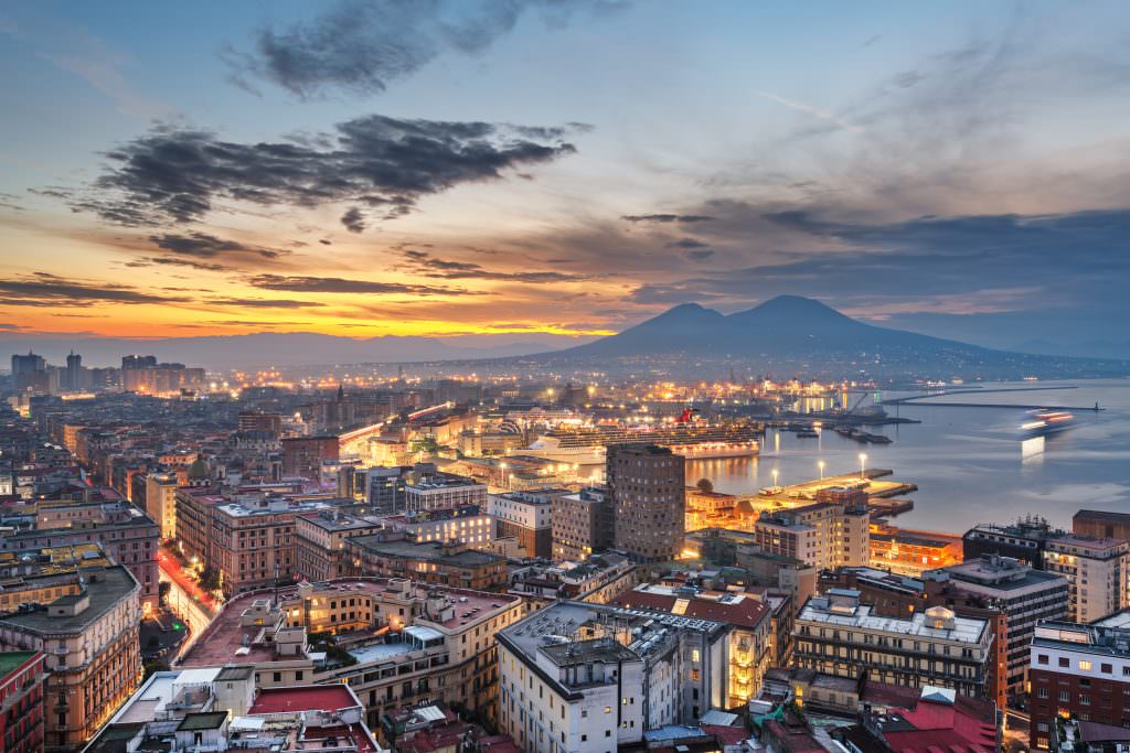 Naples yacht charter city skyline with Mount Vesuvius Gulf of Naples Mediterranean yacht charter destination Italy