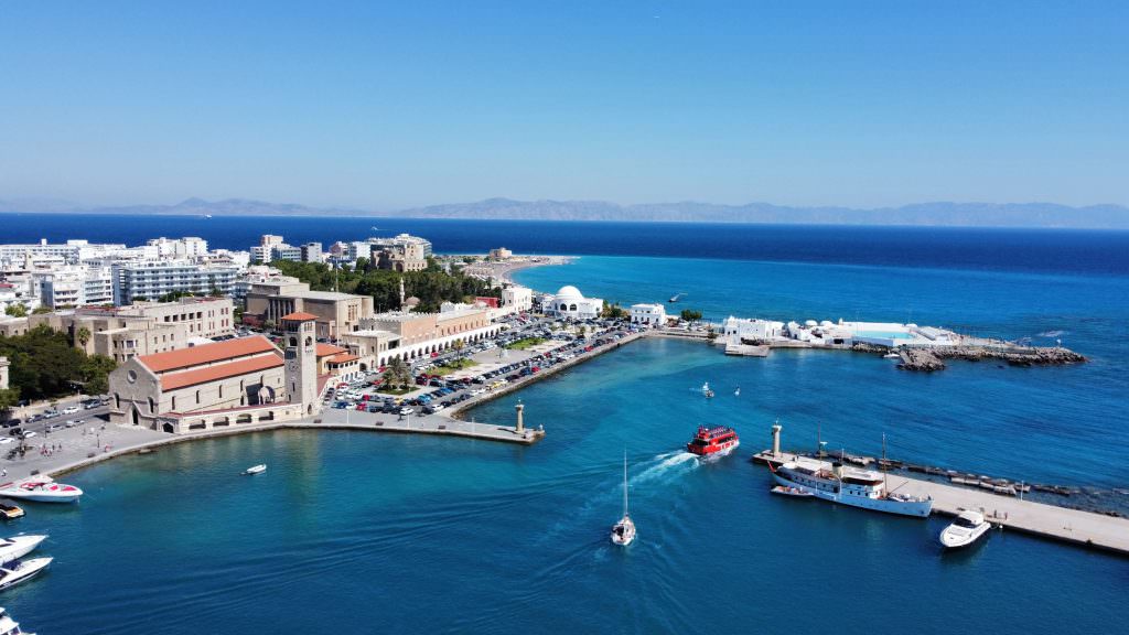 Rhodes to Kos yacht charter itinerary Greek islands Aegean Sea coastal view