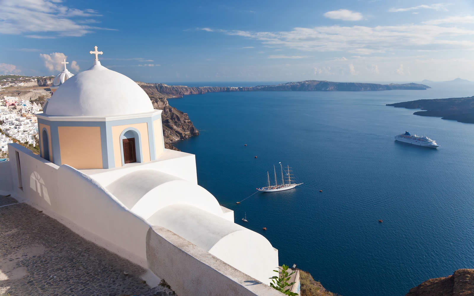 Santorini caldera luxury yacht charter view
