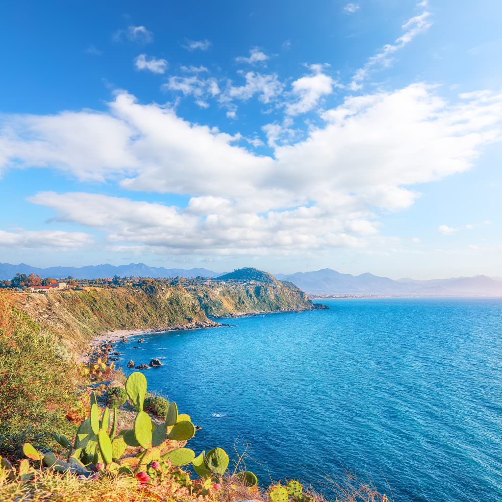 rocky cliff coastline Sicily Italy Mediterranean yacht charter destination