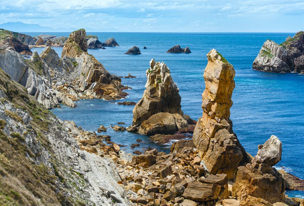 Wild rocky cliffs along the Atlantic coast of Spain scenic yacht charter coastline