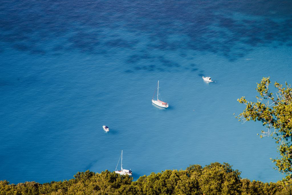 Tilos yacht charter Turquoise bay with sailing yachts in Tilos island Greece