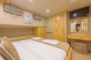 Belgin Sultan guest cabin interior with elegant design, double bed and luxury yacht accommodation details