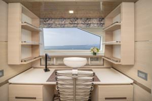 Kaira Yachts – Charade yacht office workspace interior with sea view