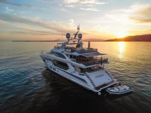 Kaira Yachts – Charade yacht aerial sunset view at sea