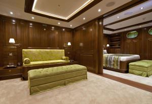 Clear Eyes gulet VIP cabin interior, luxury yacht spacious suite with lounge seating, elegant wooden finishes and premium comfort for an exclusive onboard stay