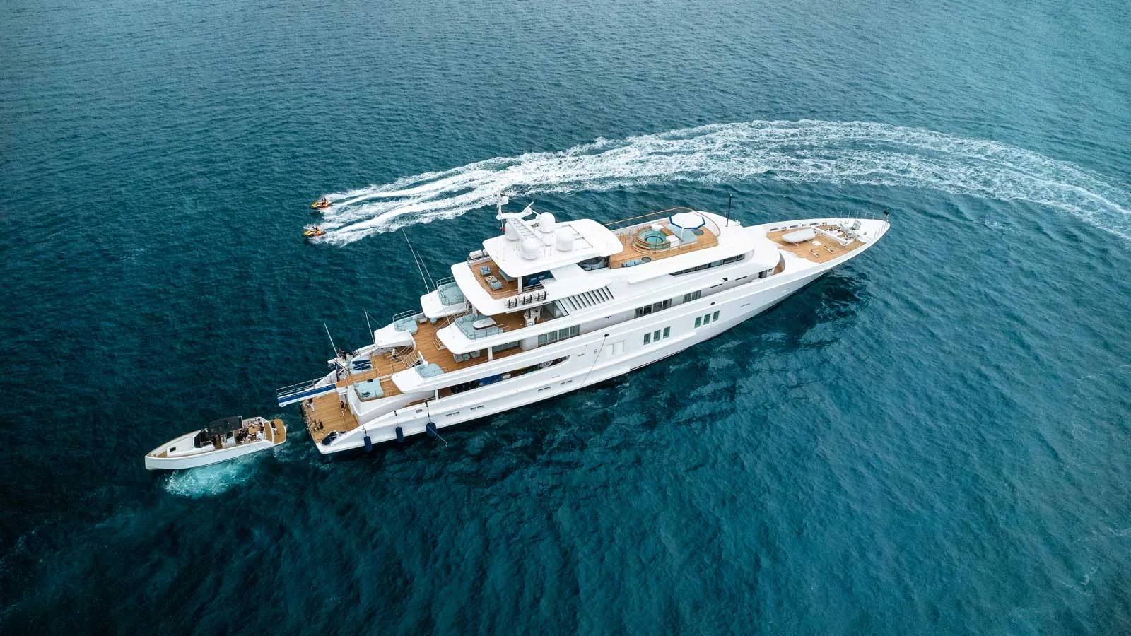 Ultra-luxury private superyacht cruising at sea