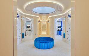 Kaira Yachts – Coral Ocean yacht atrium luxury interior with central staircase design