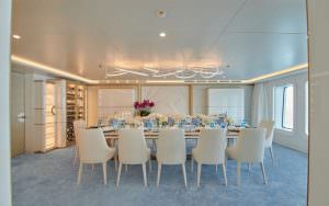 Kaira Yachts – Coral Ocean yacht formal dining area luxury table setup