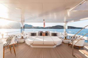 Luxury yacht sundeck daybed lounge JOY yacht sunbathing area sea view