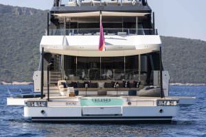 Legasea luxury yacht charter aft view showing full deck layout, lounge area and sea surroundings