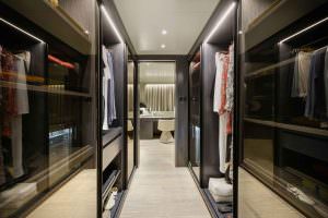 Legasea luxury yacht walk-in closet with wardrobe storage, modern lighting and elegant interior design
