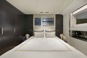 Legasea luxury yacht bedroom cabin with double bed, modern lighting and elegant interior design