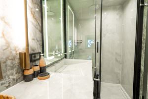 North Wind motor sailer bathroom modern shower, luxury yacht interior with marble finish, sleek design and premium amenities