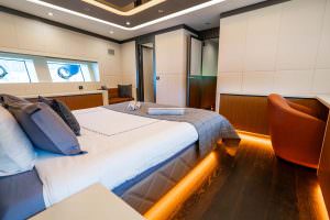 North Wind motor sailer master cabin wide view, luxury yacht interior with spacious design, ambient lighting and elegant modern comfort