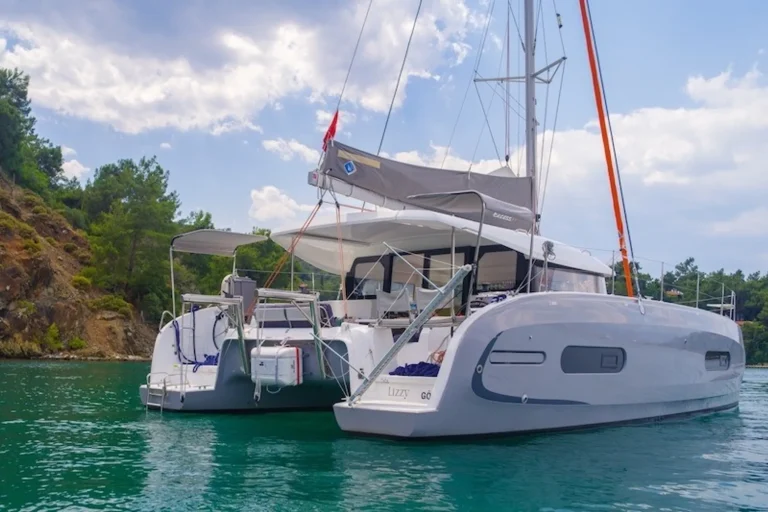 Lizzy Catamaran charter yacht side profile on water